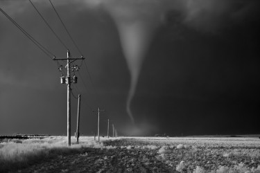 Tornado crossing power poles